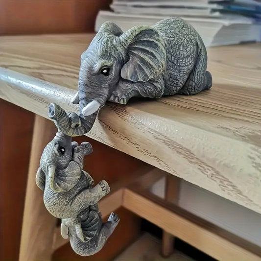 Fun Ceramic Elephant Ornaments Designed to Hang Playfully By Their Trunks From any Surface These Little Guys Bring Instant Humor and Charm